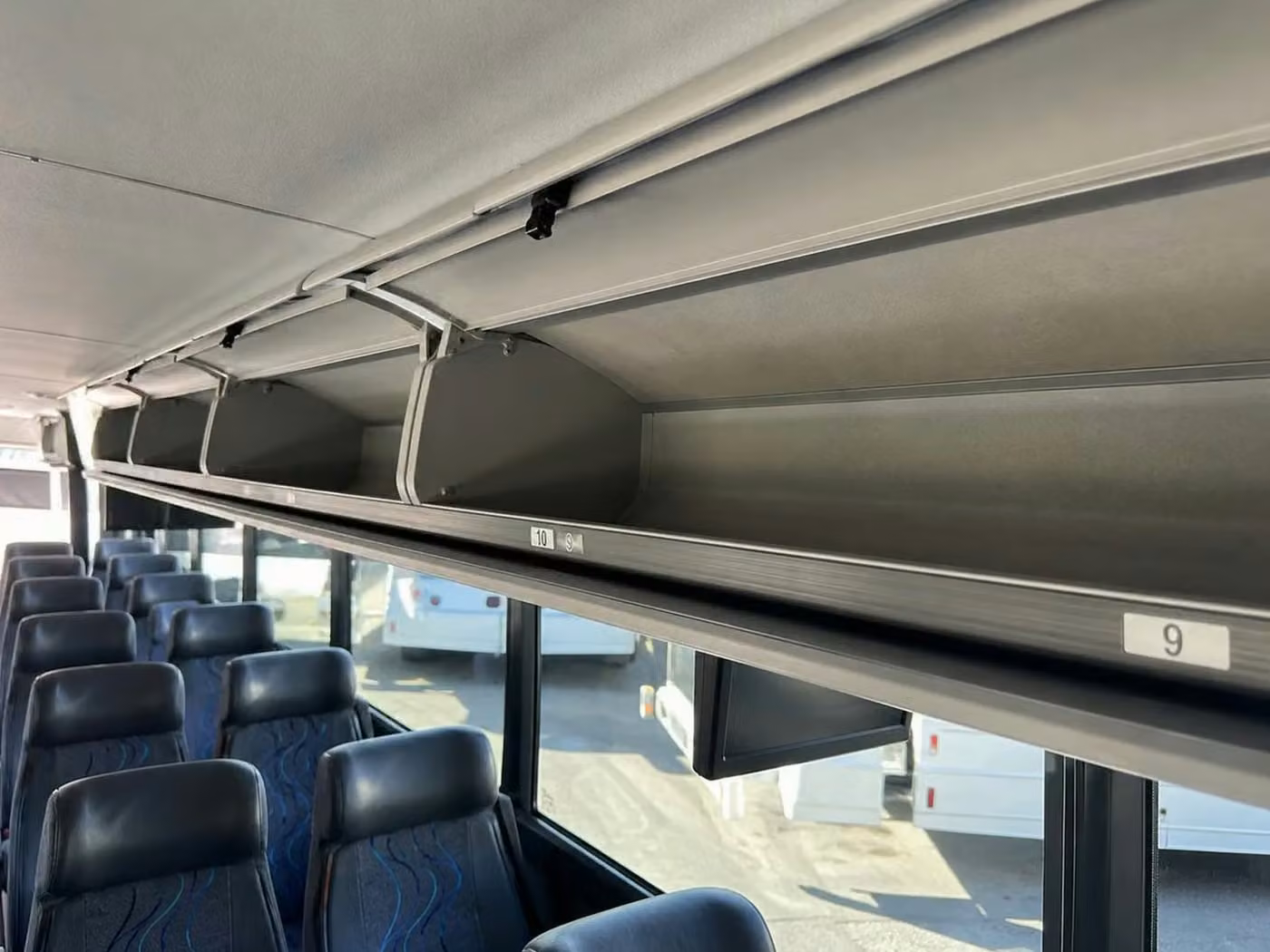 peachtree city 25 passenger minibus overhead storage