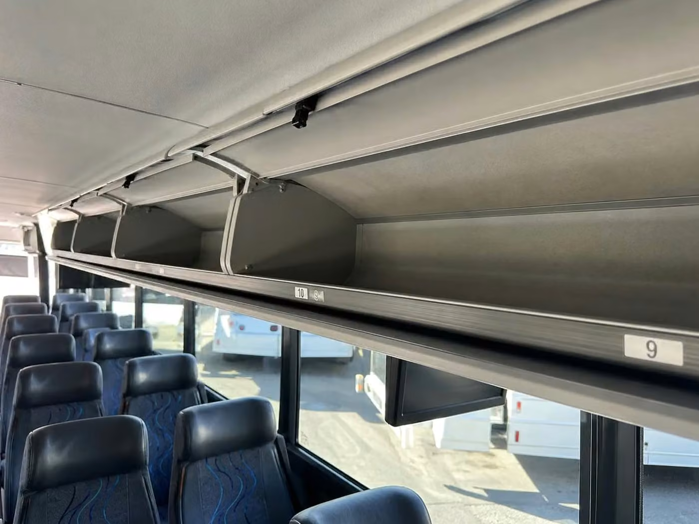 peachtree city 56 passenger charter bus overhead storage