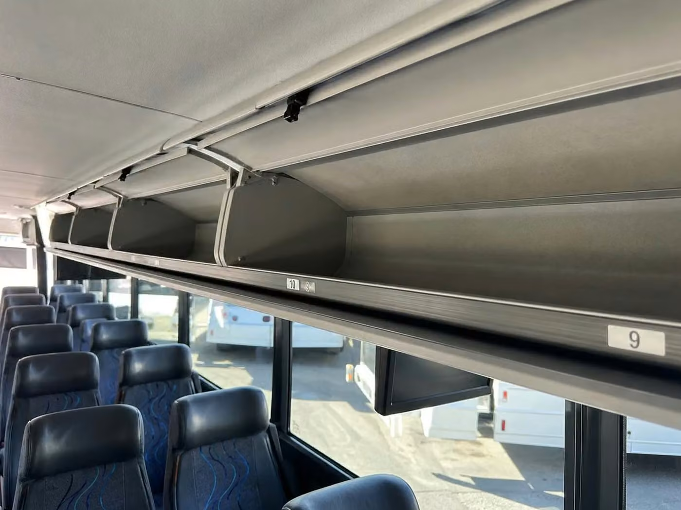 peachtree city charter bus overhead storage